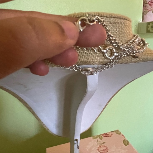 Elegant Silver Layered Necklace with Circular Accents - Picture 6 of 7